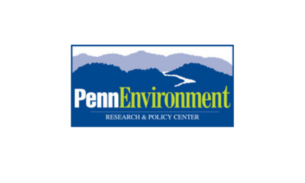 PennEnvironment logo with Penn in white font and Environment in green font in front of blue mountains